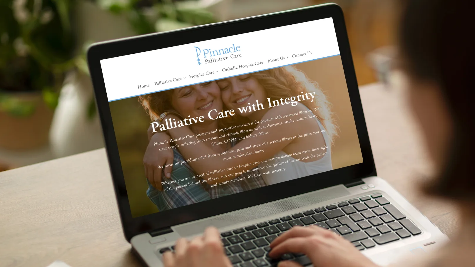 Client website displayed on a laptop